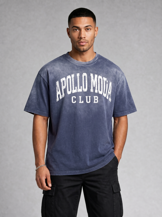 Man wearing a blue t-shirt with 'Apollo Moda Club' text on a gray background